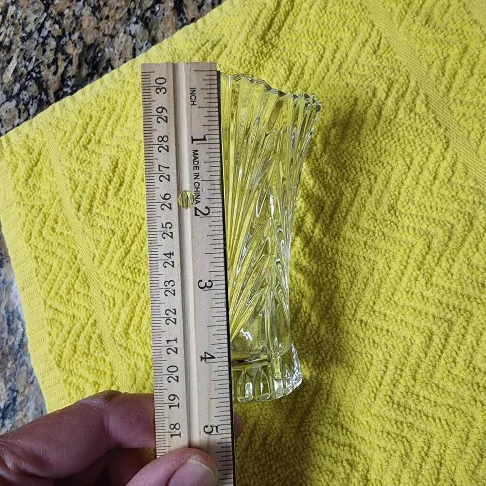 Clear heavy small glass vase approximately 4.75 inches tall